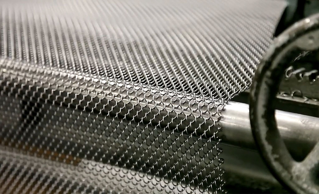 Metal coil drapery production machine in the production process