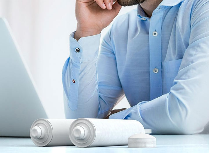 A man is looking at the computer